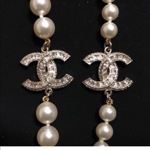CC pearl strand with two double crystal CC's. Guaranteed authentic